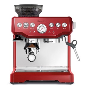 Red Breville Barista express espresso maker with integrated cup warming tray.