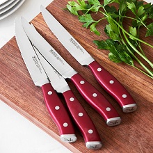 German stainless steel 4 piece steak knife set by J. A. Henckels.